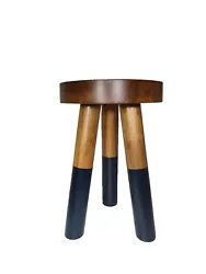 Side table. Elevated plant stand. Stylish bath caddy. This teak stool does it all. Shaped entirely by hand  solid hard...