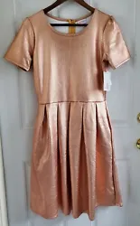 Rose gold foil look. Side Pockets. A very stunning dress!