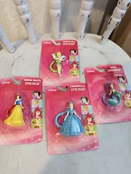 New 4 Collectible Disney Figures - Tinkerbell, Snowwhite, Cinderella & Ariel.  New, never opened packages  Figures are...