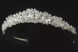 This classic and dazzling tiara is a traditional headpiece that shines with radiance! With a beautiful princess peak...