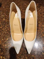christian louboutin white heels. ONLY WORN ONCE!!!! small marks on the inside of both shoes and small mark on left toe...