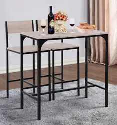 Set up a spot for entertaining family and serving up breakfast with this industrial table and stool set. This table set...