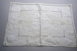 A wonderful piece for a vanity, dresser or night stand or small table. It has an embroidered floral design at each end....