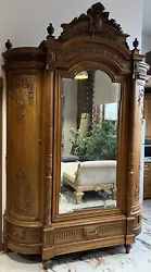 Honore Dufin mirrored Armoire 1800’s antique. Finest quality with exceptionally fine carvings. Solid walnut. Signed...