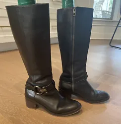 Really nice leather knee high boots with a medium high block heel. Only notable flaws are some wear to the heels and...