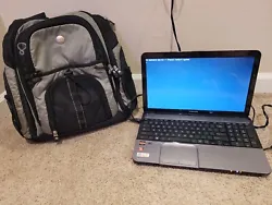 Toshiba laptop with no hard drive, comes with adapter and laptop bag, either repair or parts.