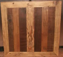You are looking at a beautifully hand made barn wood table top.