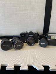 Vintage Vivitar 250 SL 35mm SLR Film Camera w/ three extra lenses. Includes flash, original carrying case, and vintage...