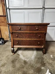 Innis, Pearce, and Co. Antique Dresser. Dresser is missing a wheel. Please refer to photos for condition. Local pick-up...
