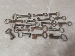18 keys in this group. Came from a big collection. Keys are all in good shape. One has a noticable bend. One has a...