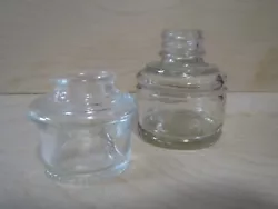 Set of 2 old glass inkwells. The shorter one is a desk insert model marked 