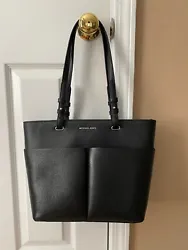 Coach tote that is medium and black. Used but in great condition. 