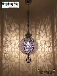 Add an exotic touch with this unique and eye catching lamp. Light up the room with the Shadow Effect Hanging Lamp. This...