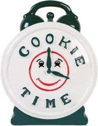 It is made of ceramic. Yes it is it’s very very decorative no matter where it sits. The color of the cookie jar to...