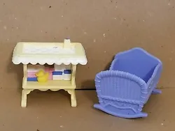 Fisher Price Loving Family dollhouse Everything for Baby. yellow changing table with a shelf underneath. This lot...