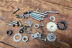 OEM 1974-75 Kawasaki KS125 Assorted Engine Side Cover Internal Bolts Parts And Gears  Im parting out this KS125 and a...