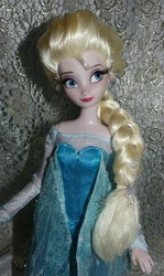 Fully articulated Elsa doll had her hair styled more like in the movie, with sparkles added (sequins are sewn into her...
