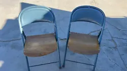 Selling a pair of Vintage Wooden Seat Folding Chairs from American Seating Company Grand Rapids. 