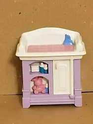 Fisher Price Loving Family Dollhouse. Nursery furniture. Changing table for a baby doll. Its purple and white. The top...