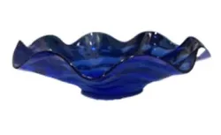 This beautiful cobalt blue vintage bowl with a rolling wave pattern is perfect for any occasion! The light catching...