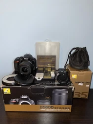 Nikon d5600 w/ AF-S DX Nikkor 35mm f/1.8G & Accessories.Camera is in beautiful condition, well taken care of and has...