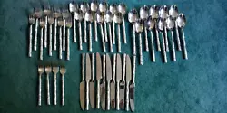 Set in Bamboo style. Good condition w/ normal wear. 11 tea spoons.