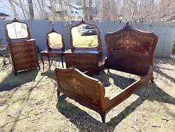 4 piece incredible inlaid with mother of pearl mahogany bedroom set, signed Robert Mitchell, Cincinnati, Ohio. The bed...