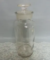Antique apothecary jar with glass stopper. Marked W.T. & co. Bottle is very clear and clean. One tiny flea bite on the...