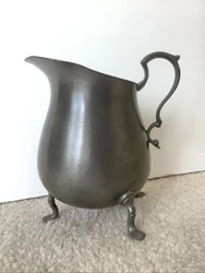 Listing is for a vintage Pewter pitcher by International Pewter.Great for milk, cream, dressing, gravy, or even hot...