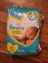 Pampers Swaddlers Disposable Baby Diapers Preemie 27 Count, 6LBS, DOLL DIAPERS. No rips or stains comes from a smoke...