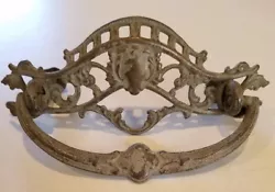 Looks very old and could use a cleaning. I dont know what it is made of.