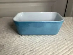This vintage Pyrex 0502 mini loaf pan is a charming addition to any kitchen. Its lovely blue turquoise color and solid...