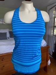 Silky soft fabric blend is 92% polyester, 8% spandex knit. Seamless construction, great for yoga.