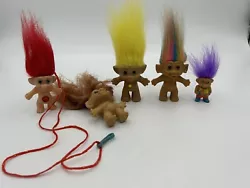 Lot of 5 Vintage Russ Berrie Trolls Dolls Necklace Troll included.They are in great conditions for their age. Please...