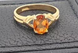Oval citrine set in 14KT yellow gold. Hallmarked 