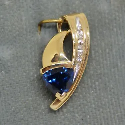 Created sapphire pendant with diamond accents. 10 mm wide.