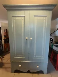 Two large lower drawers. Large porcelain knobs.