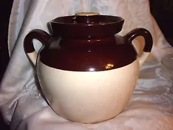ROSEVILLE Pottery R.R.P.O.- Lidded Stoneware bean pot/crock. Colors are brown and tan. The crock has its lid. It is in...