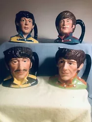 Set of 4 Royal Doulton. the Fab Four. have the serial number on the base (underside) of each jug.