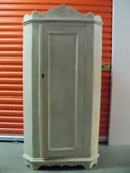 Painted or bleach pine wood, finial top and feet. One door opens to 3 shelves. Circa 1850-1880s. Perfect for a corner.