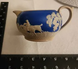 Copeland Spode England Jasper Ware Creamer Blue Hunting Scene.  I listed as porcelin but i M not exactly sure about...