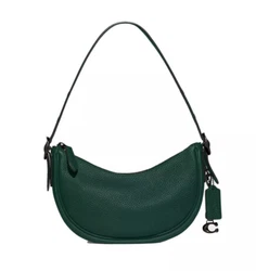 A distinctively chic shape adds instant charm to your look with this beautiful leather shoulder bag from COACH. 1...