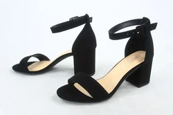 Open toe, single band at vamp. Covered chunky heel. Ankle strap with adjustable buckle. High Heel Style: 4 (approx)....
