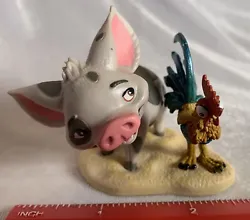 This Disney figurine features Moanas loyal animal companions, Pua and Hei Hei. The pig and rooster duo stand at 2.5...