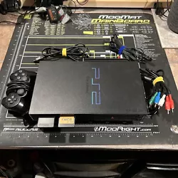 Fat PS2 with a modern SATA HDD added and Free McBoot to load games from the HDD. I will leave my HDD in tact with a...
