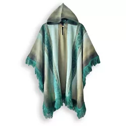 This is a brand new baby alpaca wool poncho, made of baby alpaca yarn, the finest yarns in the world. It is very soft,...