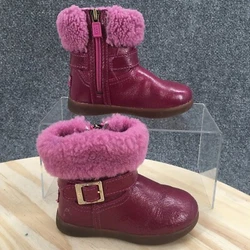 The photo with a ruler is lined up with the back of the heel and shows the approximate length of the shoe from the top...