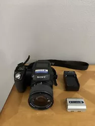 Sony DSC-R1 Digital Camera W/ Charger And Battery. TestedGood cosmetic and working condition.Ships fast and secure