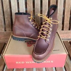 Introducing these Red Wing Shoes boots, crafted with a moc toe design and lace-up closure for a stylish look thats...