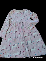 Add a magical touch to your little girls wardrobe with this beautiful Unicorn Girl dress in size 5 by Moon and Back!...